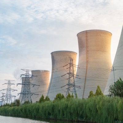 Nuclear power plant cooling towers requiring zero-leakage critical service isolation valves
